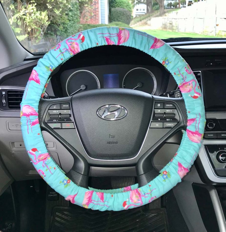 Buy your flamingo Christmas car wheel cover here on Amazon.com